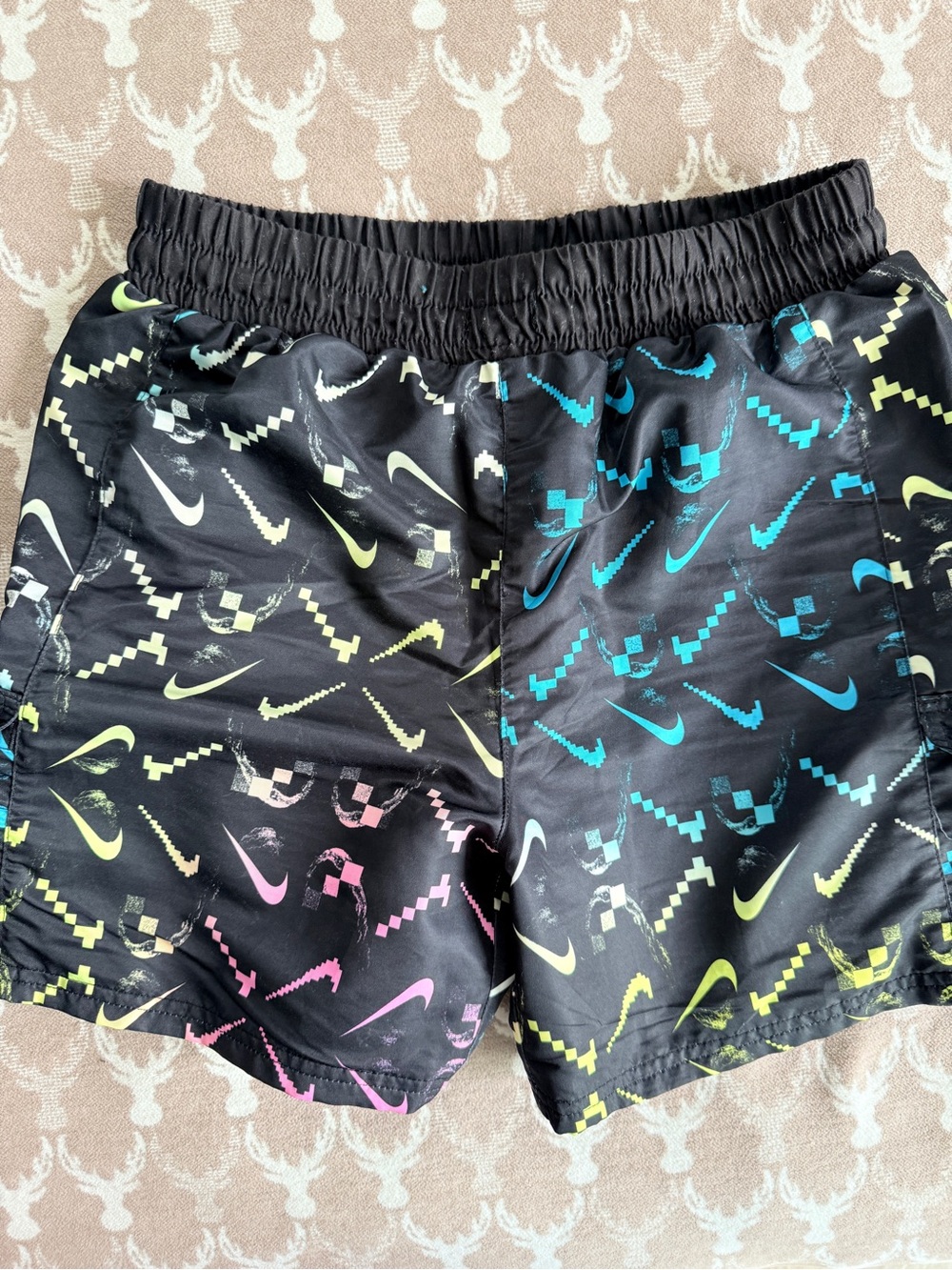 Nike Black Swimsuit with Neon Blue, Yellow and Pink Swoosh Print
